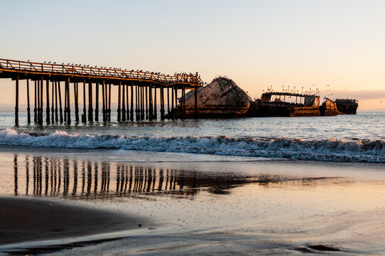 Pier and ship at golden hour