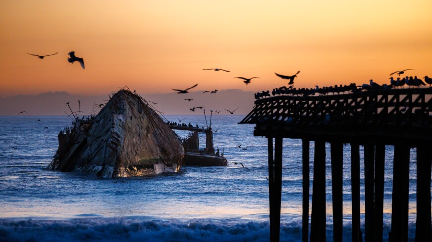 Cement ship at sunset